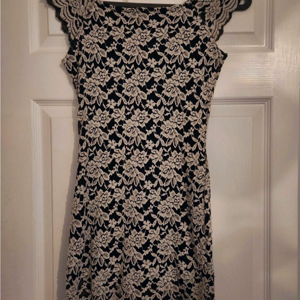 Elegant Lace Mini Dress in Black and Cream
